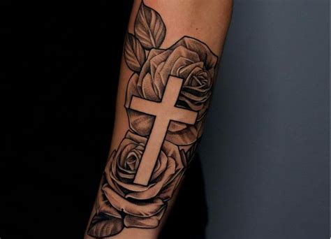 female rose and cross tattoo|cross with roses and butterflies.